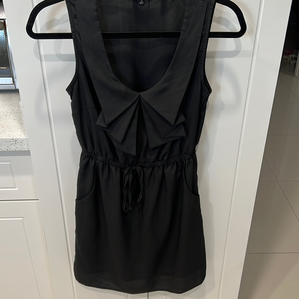 Bebop, Woman’s sleeveless black dress with pockets, size small